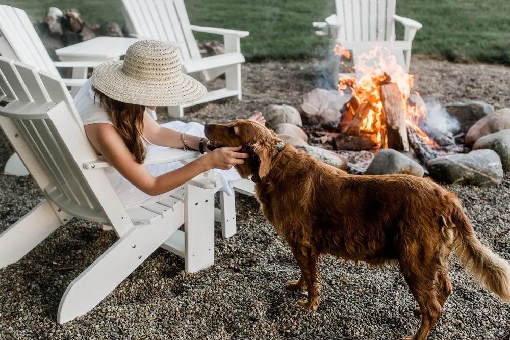 White Heritage Adirondack chairs around campfire